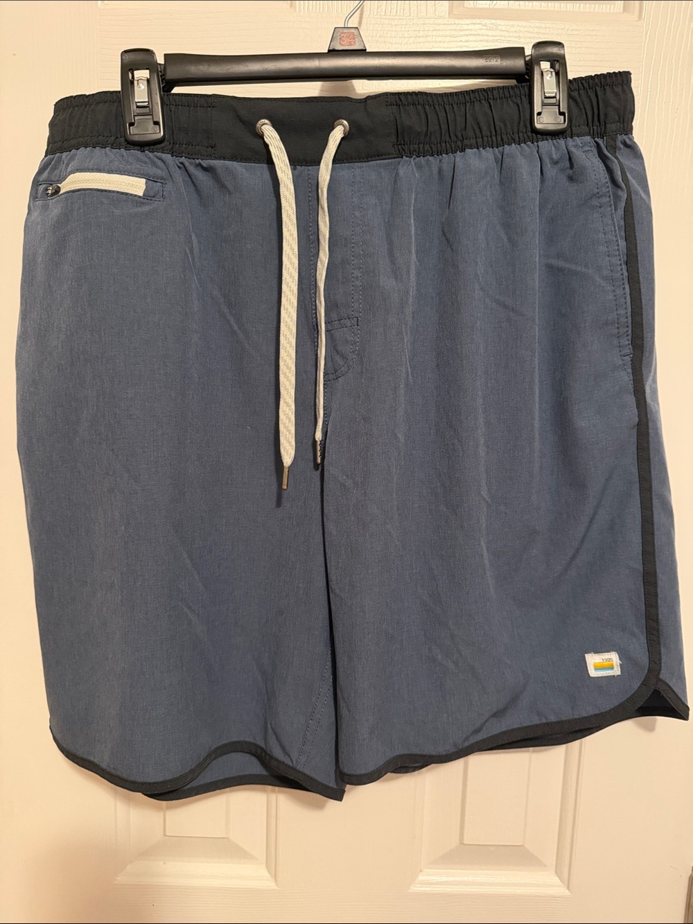 Vuori Navy Athletic Shorts with Black Waistband and Cream Drawstring